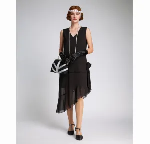 1920s evening dress in black chiffon and asymmetrical skirt