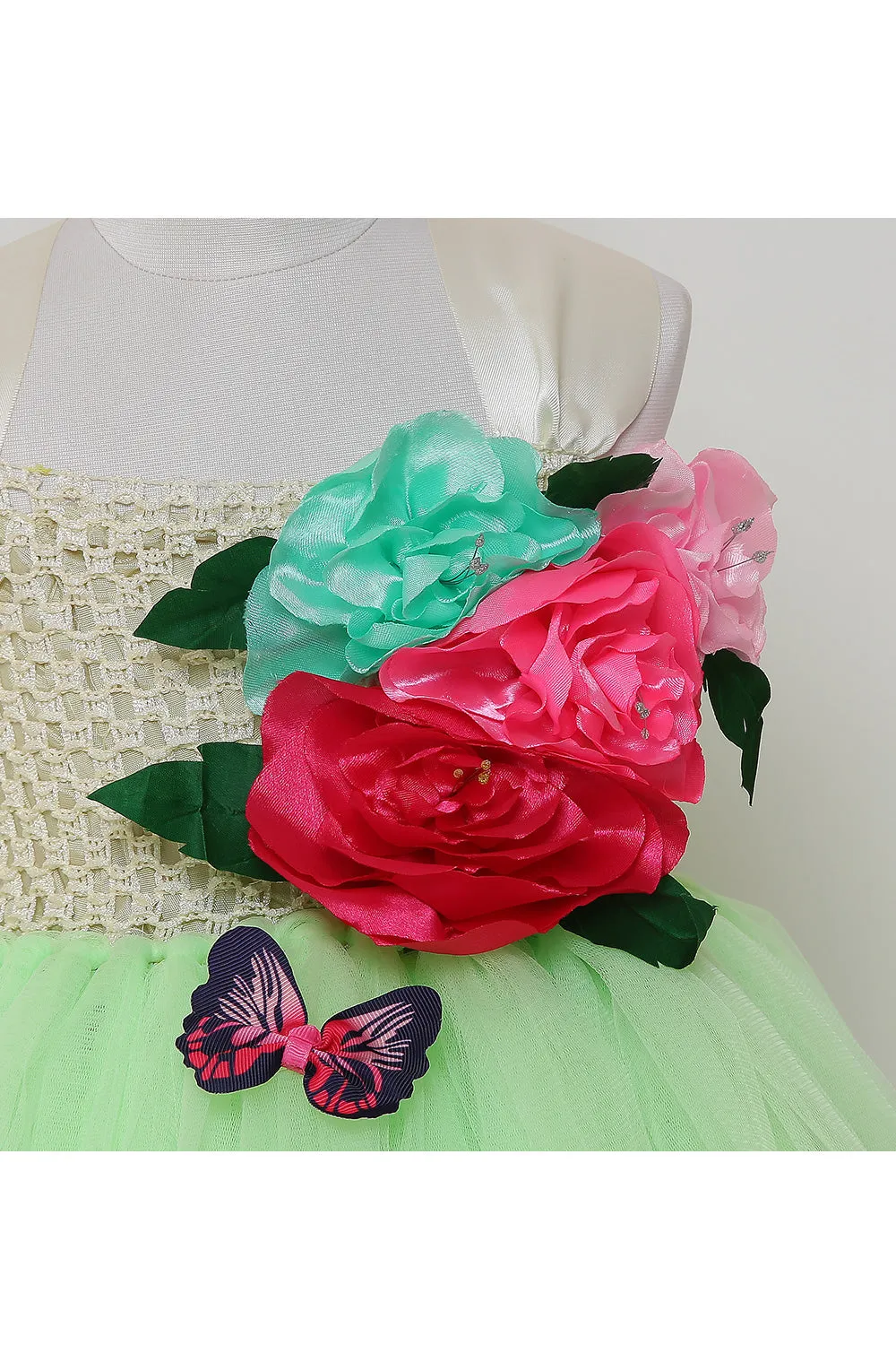 Neon green tutu gown with flowers on one side